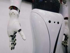 A robotic hand wearing flexible artificial skin that detects heat, pressure, and touch, developed by researchers at Cambridge and UCL