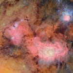 Vera Rubin Observatory captures detailed image of Trifid and Lagoon Nebulae in the Milky Way