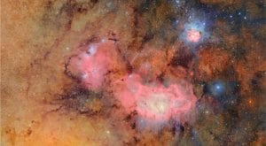Vera Rubin Observatory captures detailed image of Trifid and Lagoon Nebulae in the Milky Way